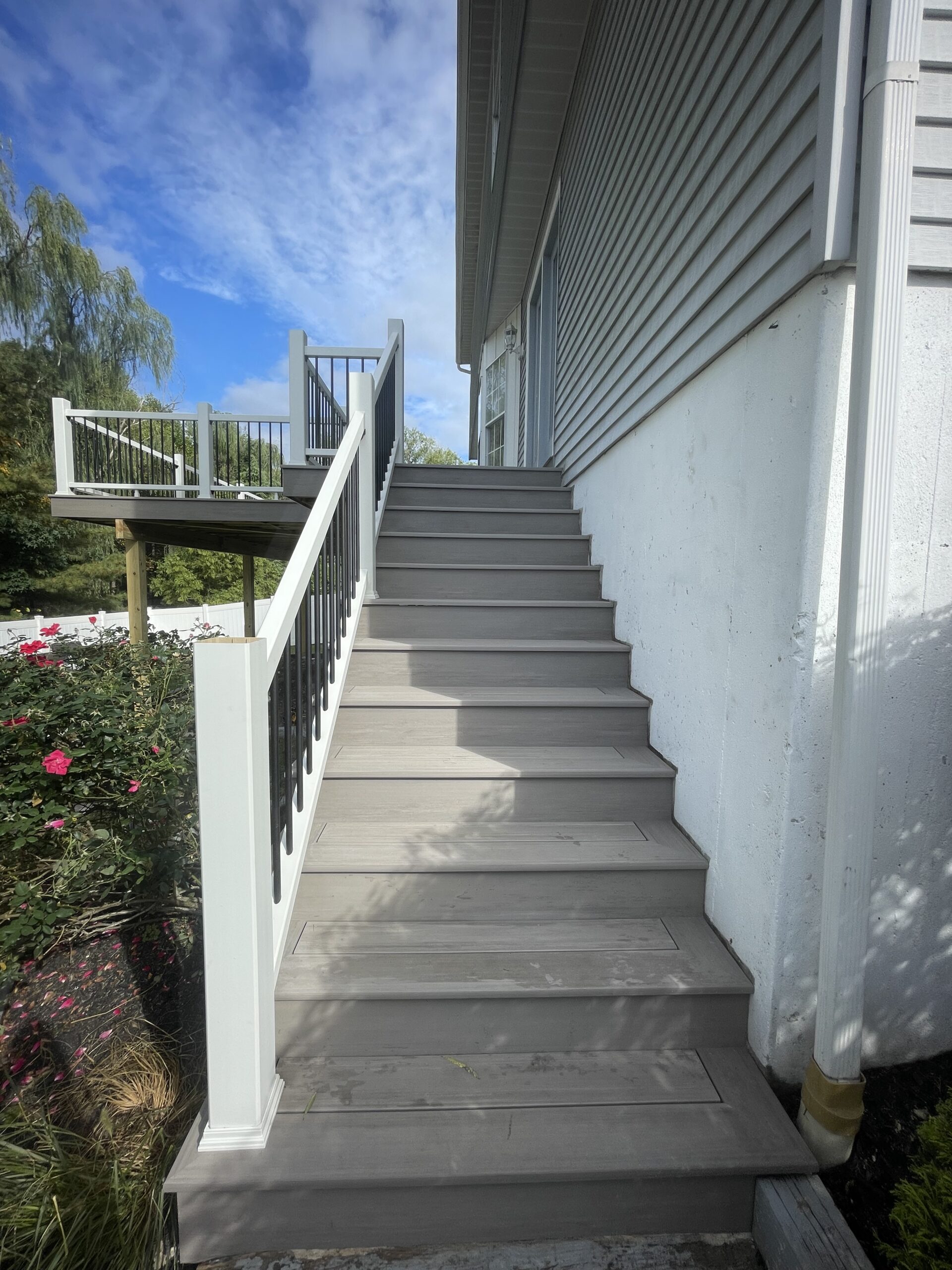 A set of stairs leading up to a house